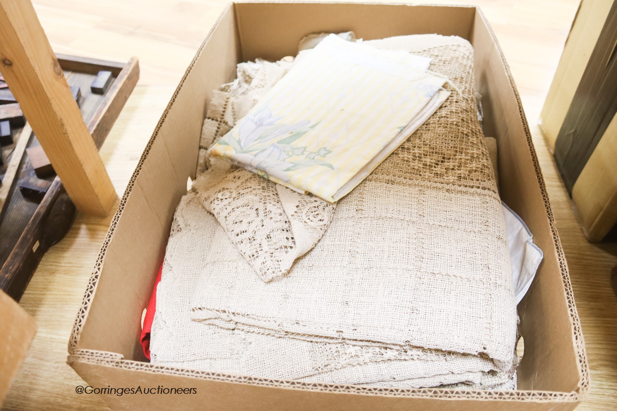 Two boxes of mixed tablecloths